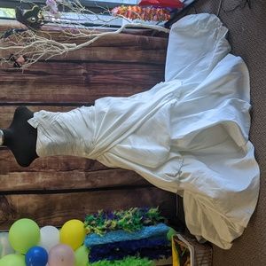 Size 10 strapless wedding dress with long flowy train.